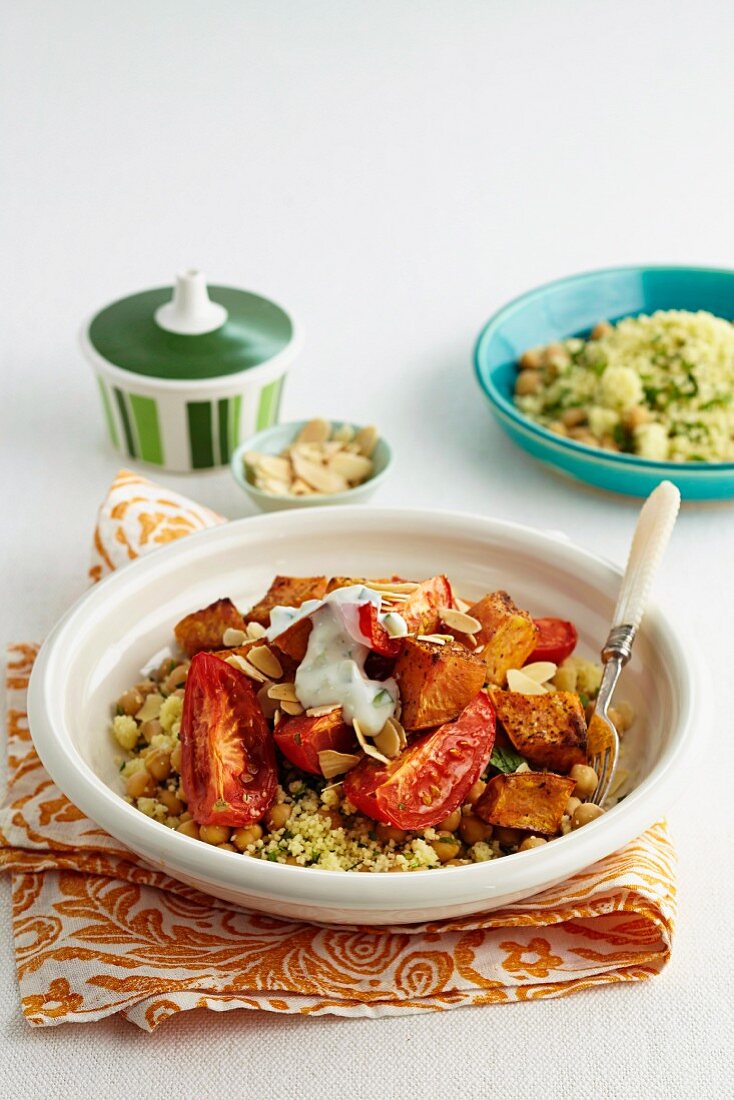 Couscous with chickpeas, roasted tomatoes and sweet potatoes