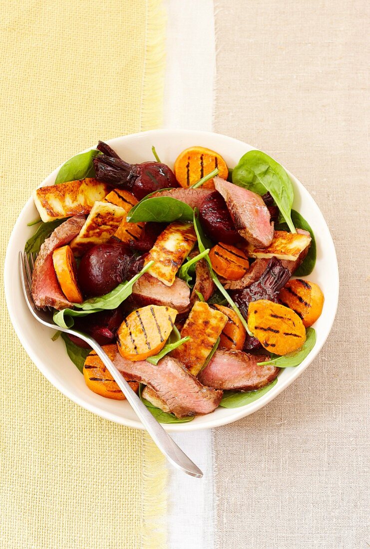 Salad with lamb, sweet potatoes, beetroot and haloumi