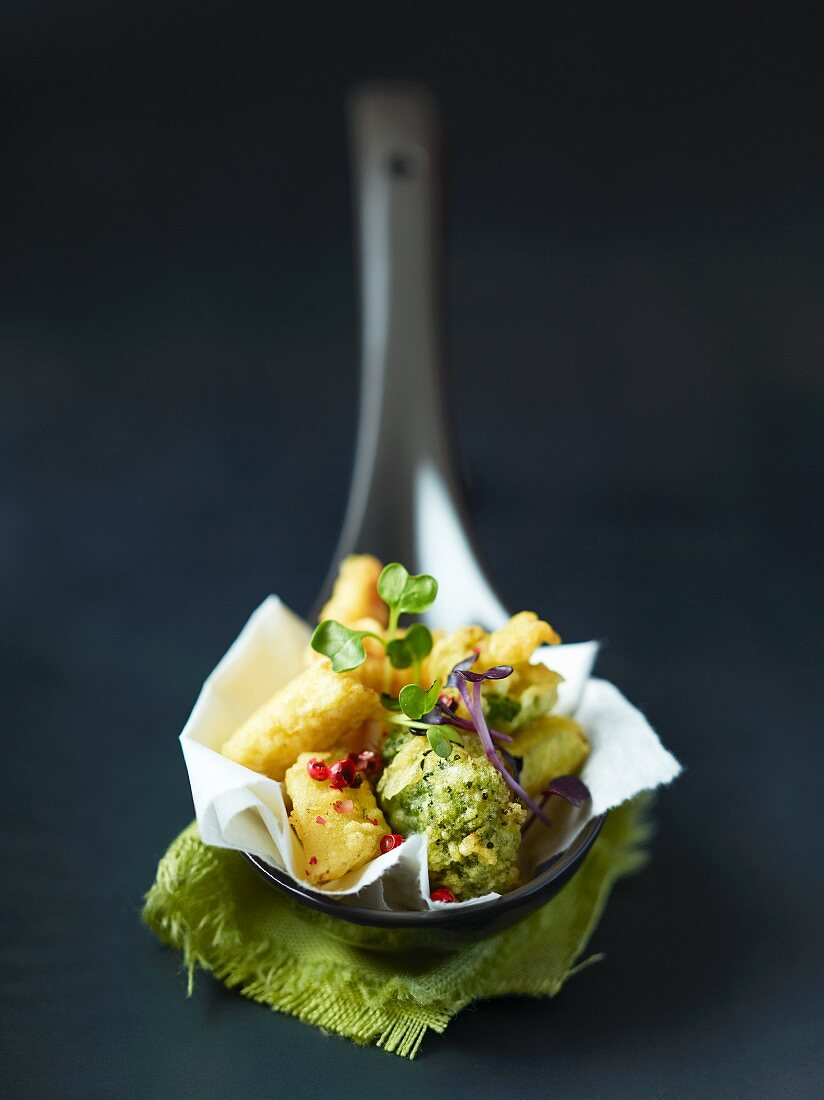 Tempura with cress on a spoon
