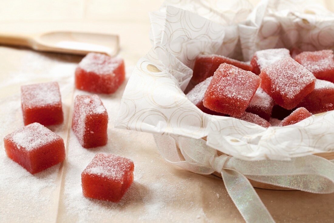 Plum jelly sweets in a gift box tied with ribbon