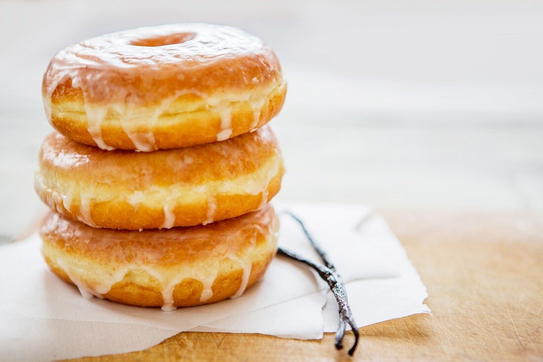 A stack of vanilla doughnuts