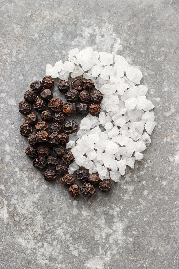 A Yin-Yang symbol made from pepper and salt