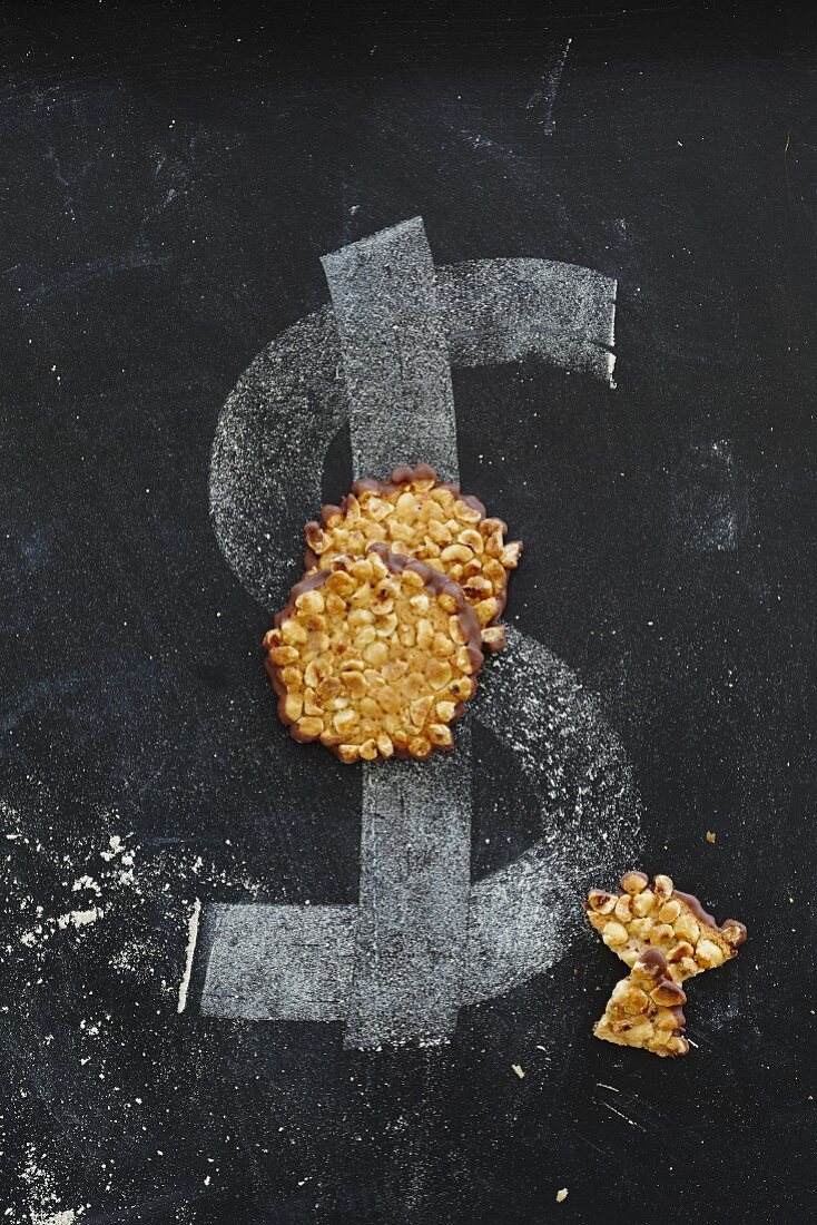 Peanut biscuits on a dollar sign