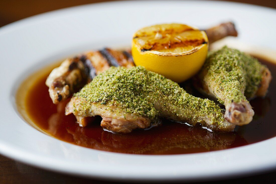 Chicken legs with a herb crust and lemon