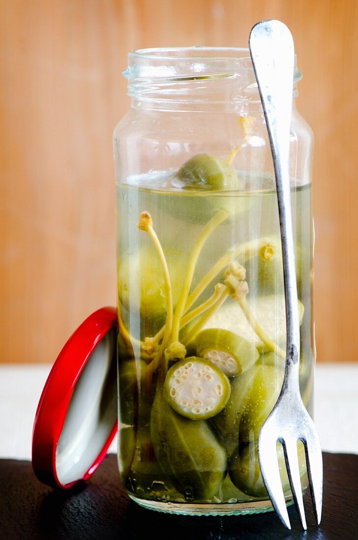 Pickled giant capers in a jar