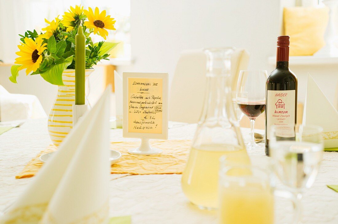 A table laid with sunflowers