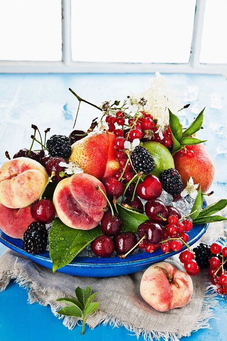 An arrangement of fruit and berries