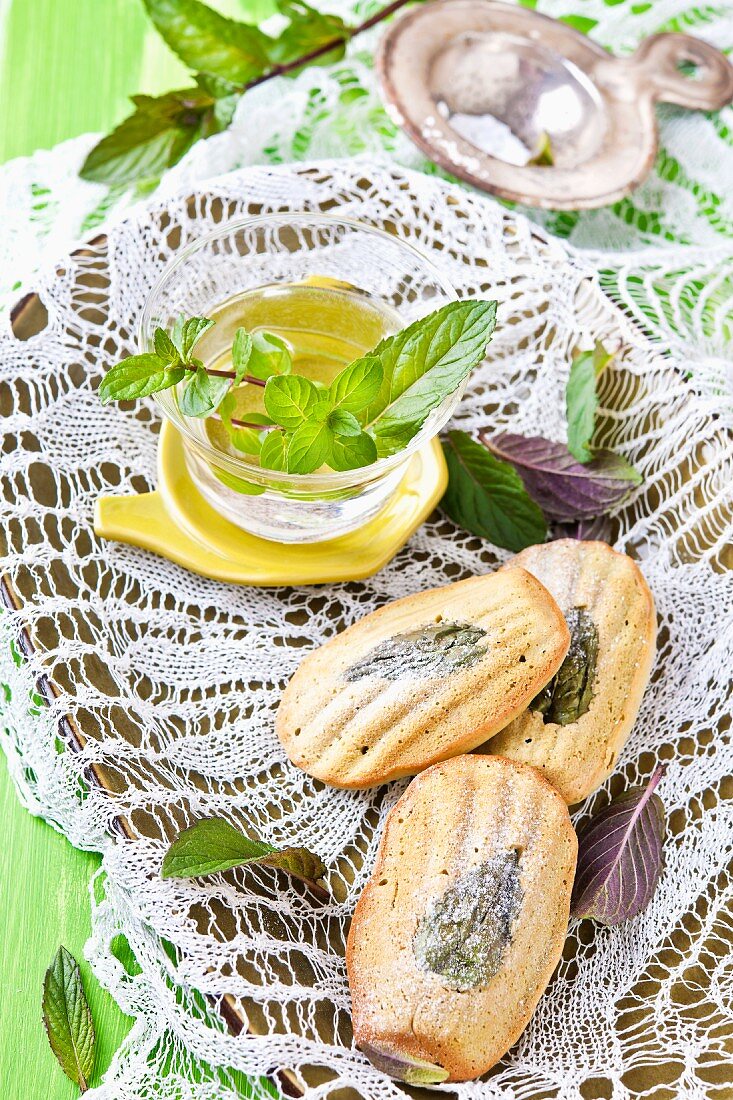 Madeleines with peppermint leaves