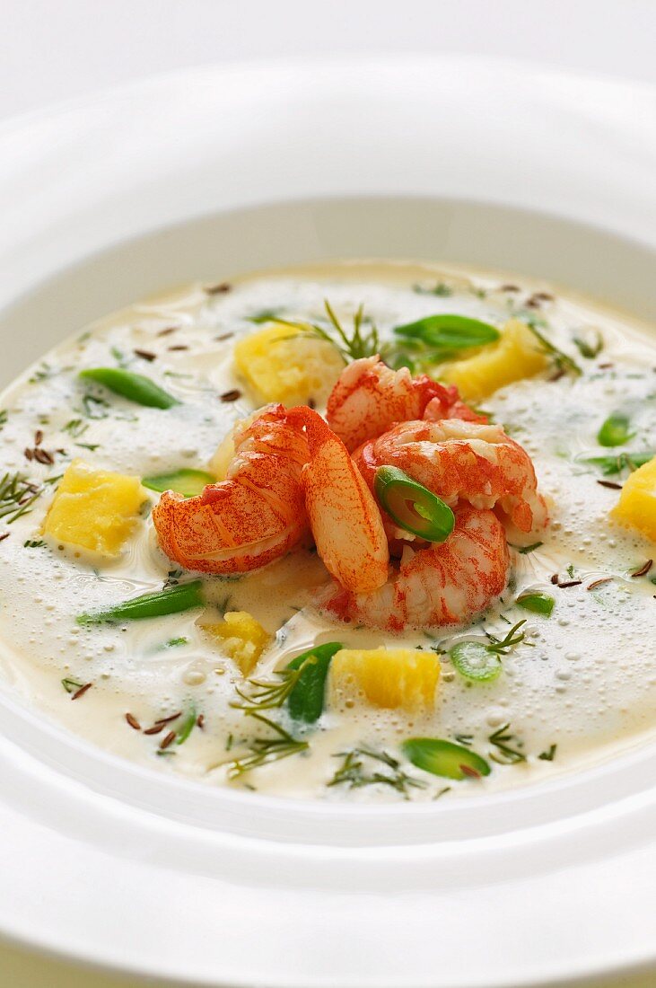 Sour cream soup with crayfish and green beans
