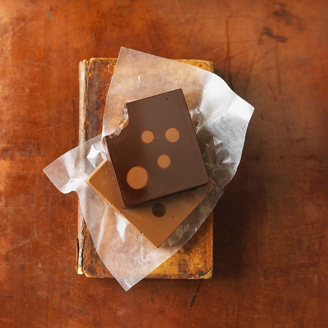 Polka dot chocolate with a bite taken out
