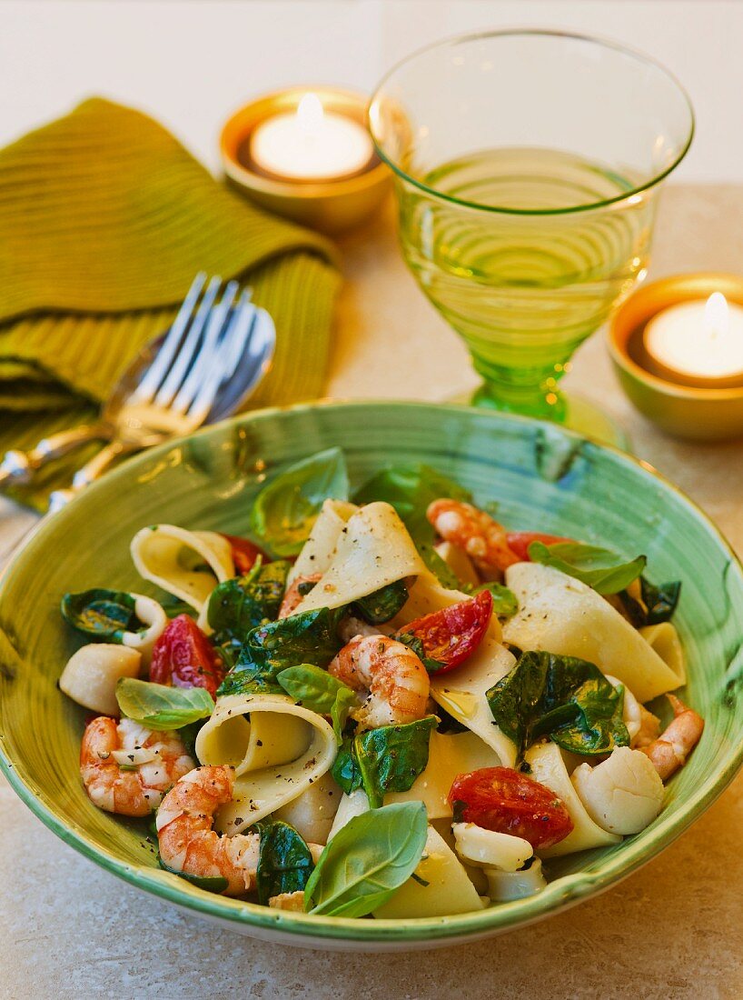 Pappardelle with seafood, tomatoes and basil