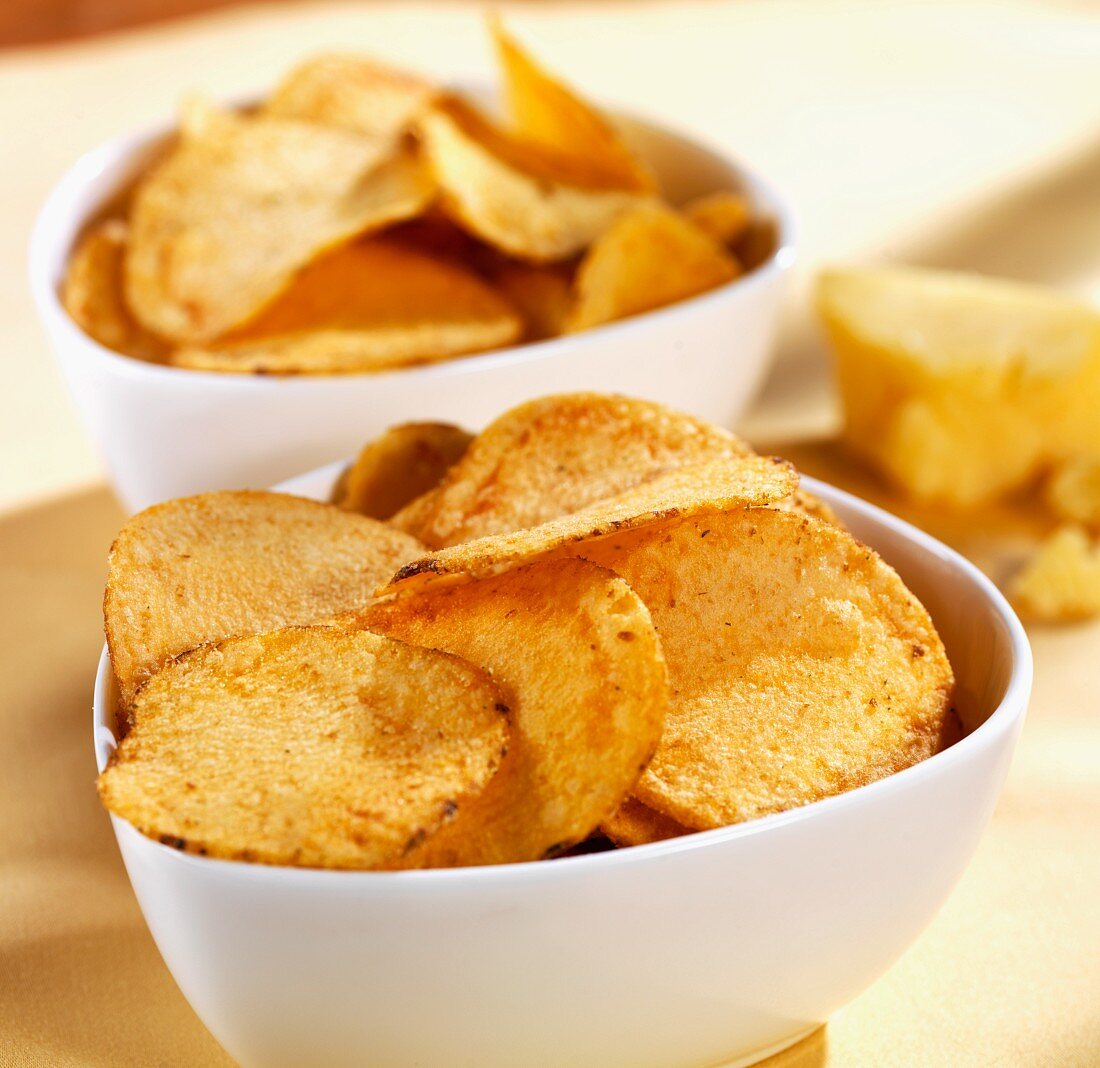 Bowls of cheesy potato chips