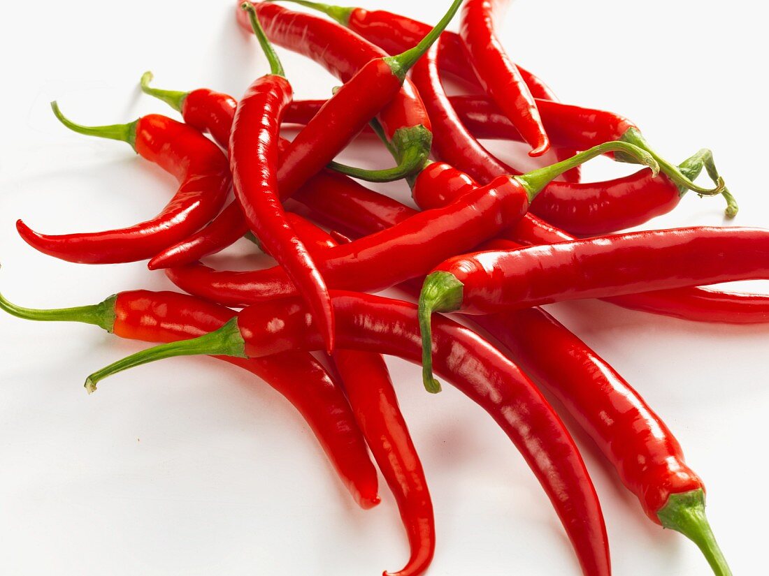 A pile of fresh red chilli peppers