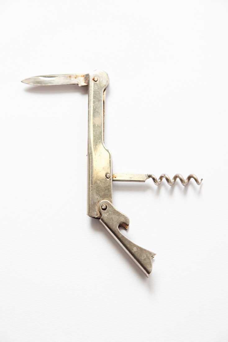 A bottle opener with a pocket knife