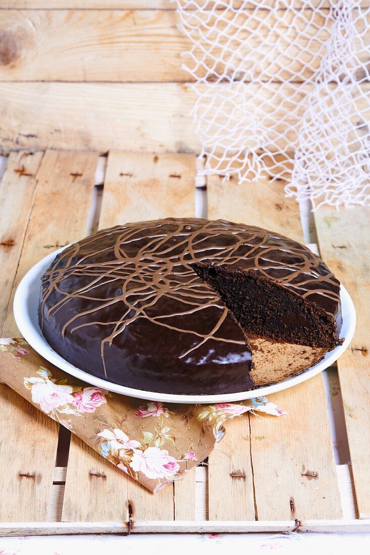 Chocolate cake, partly sliced