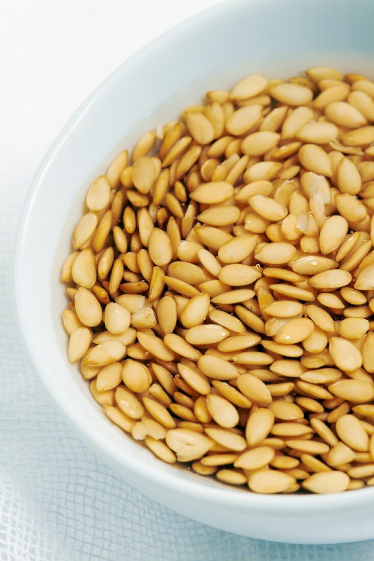 A bowl of flax seeds (close-up)