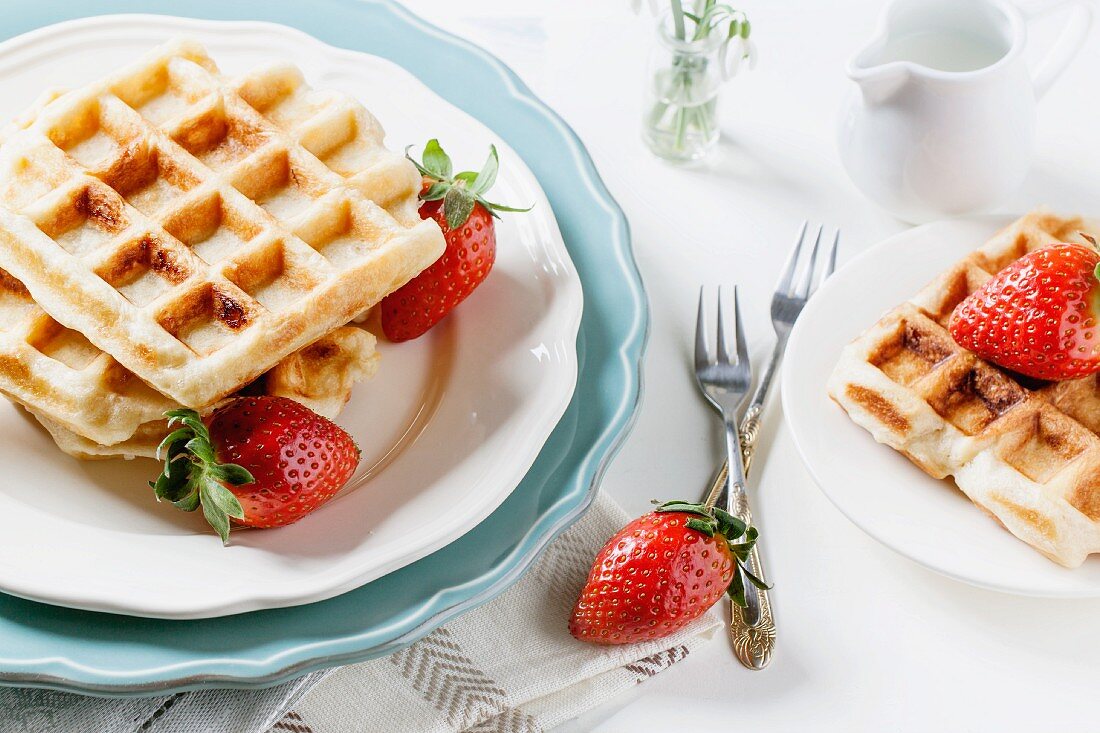 Belgian waffles served with strawberries