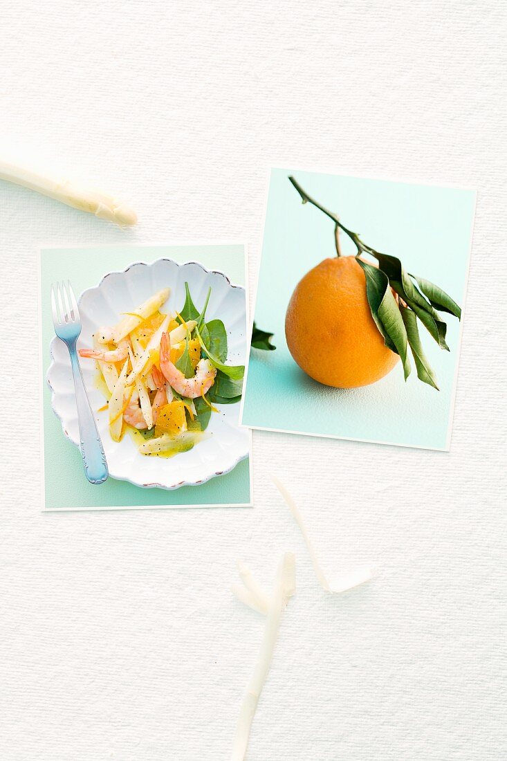 Image of an asparagus dish and an orange