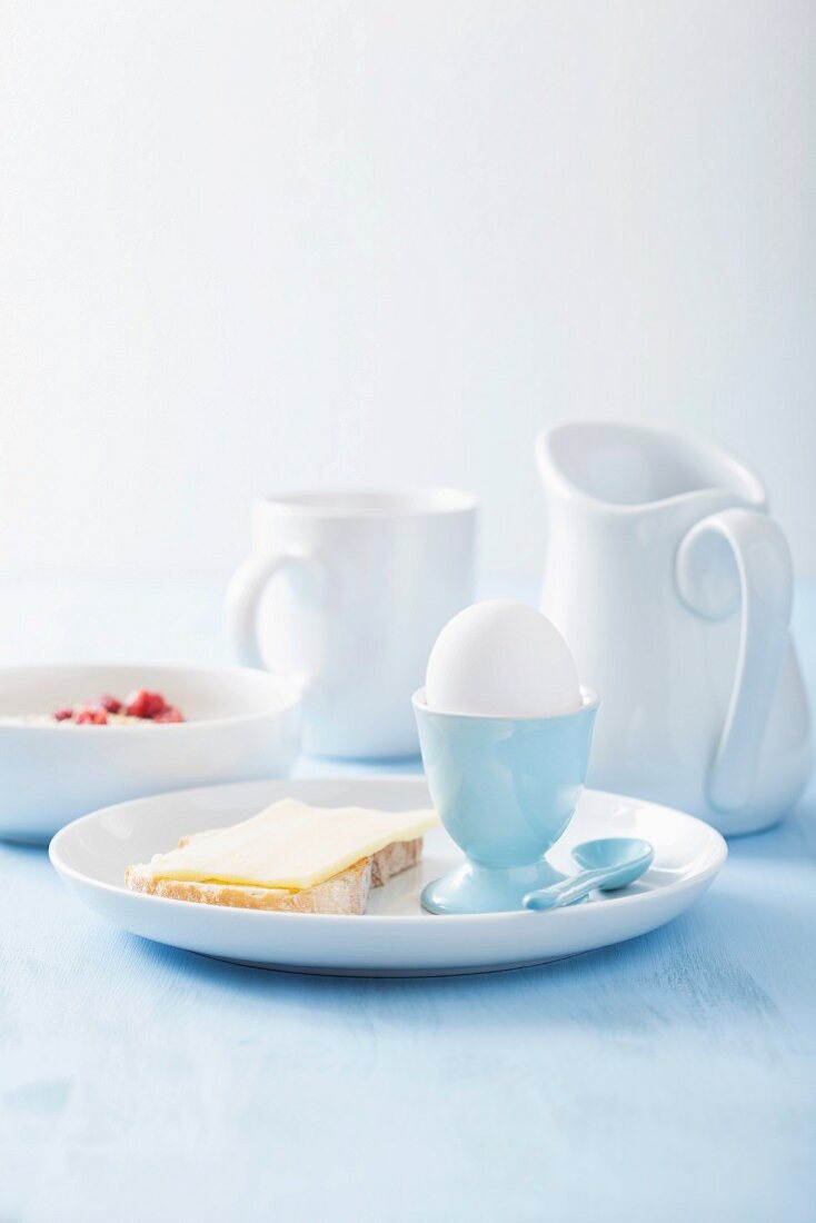 Breakfast with egg, bread and cheese and muesli