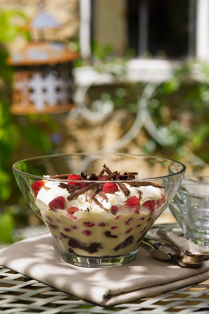 A trifle made with raspberries and grated chocolate