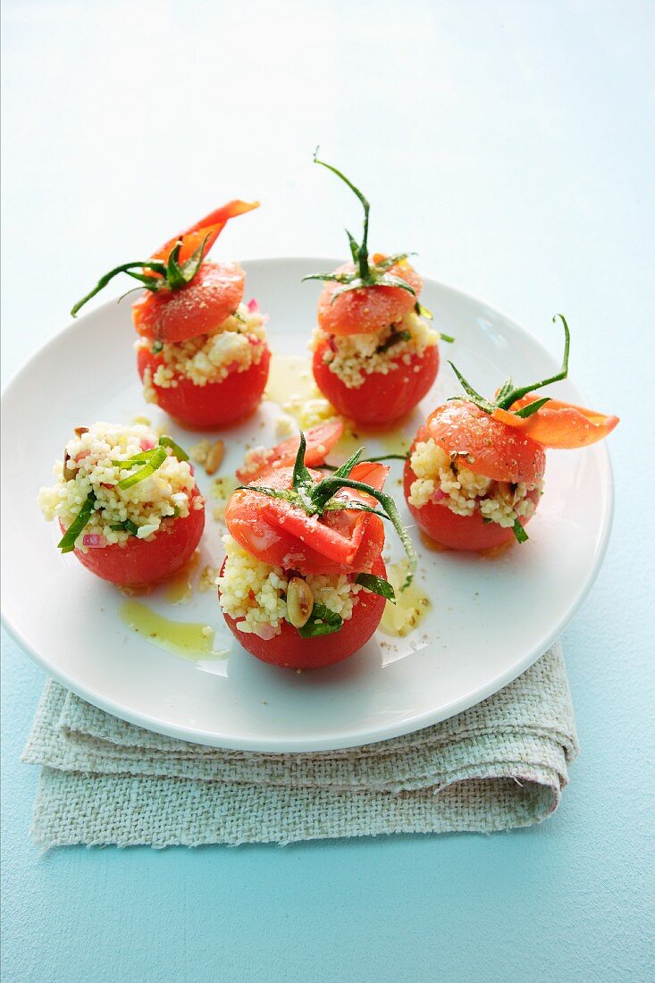 Tomatoes filled with couscous salad