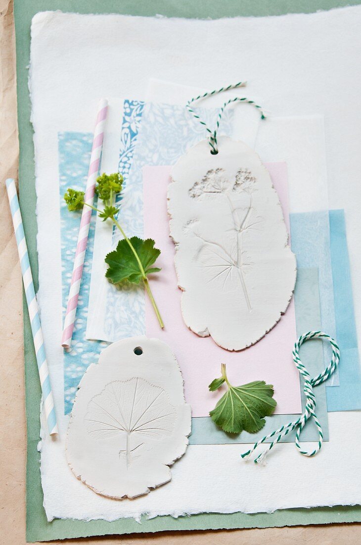 Pendants with impressions of lady's mantle flowers in plaster