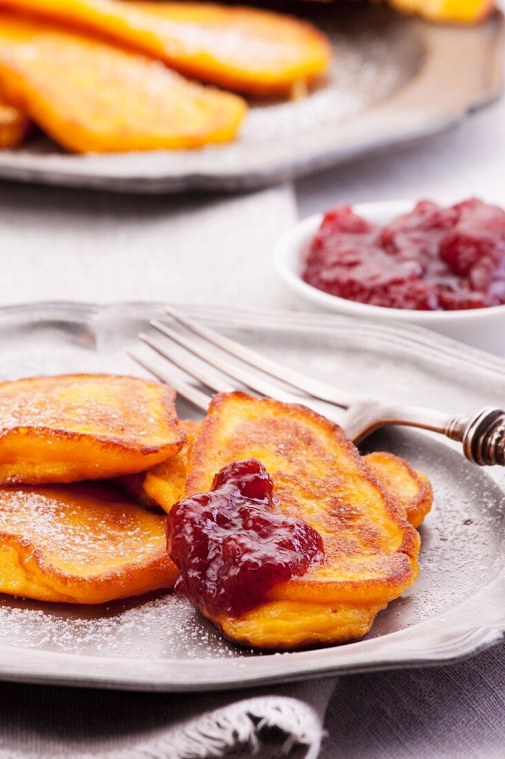 Pumpkin pancakes with cranberry jam