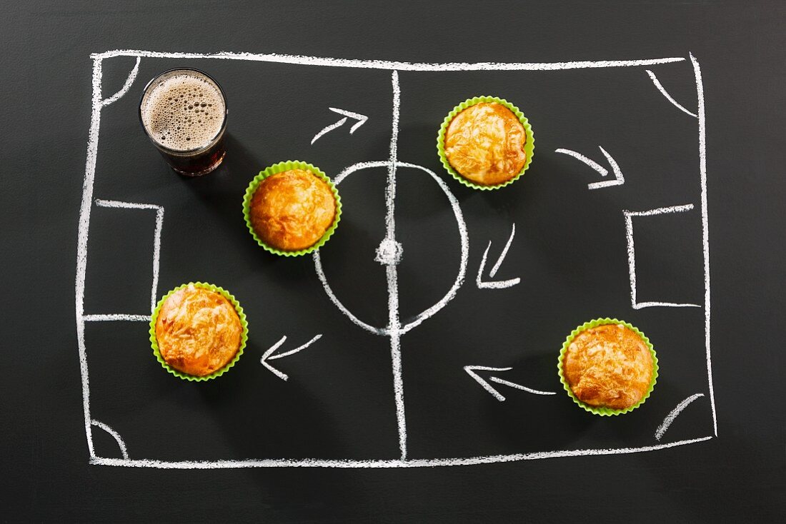 Savoury muffins and cola for a football-themed party