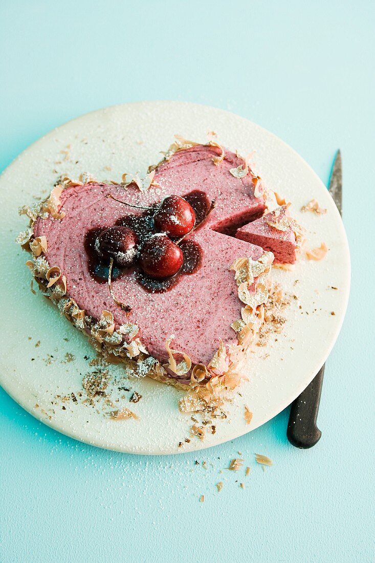 A heart-shaped cherry ice cream cake