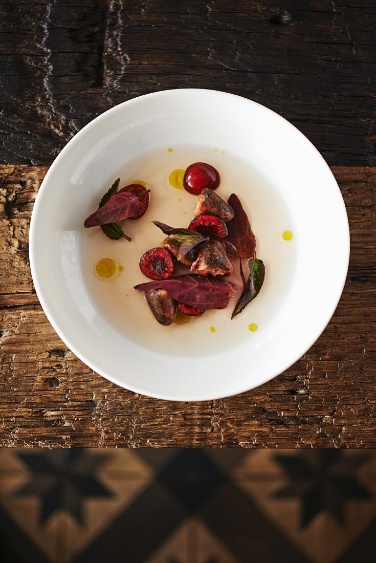 Roasted pigeon hearts with cherries