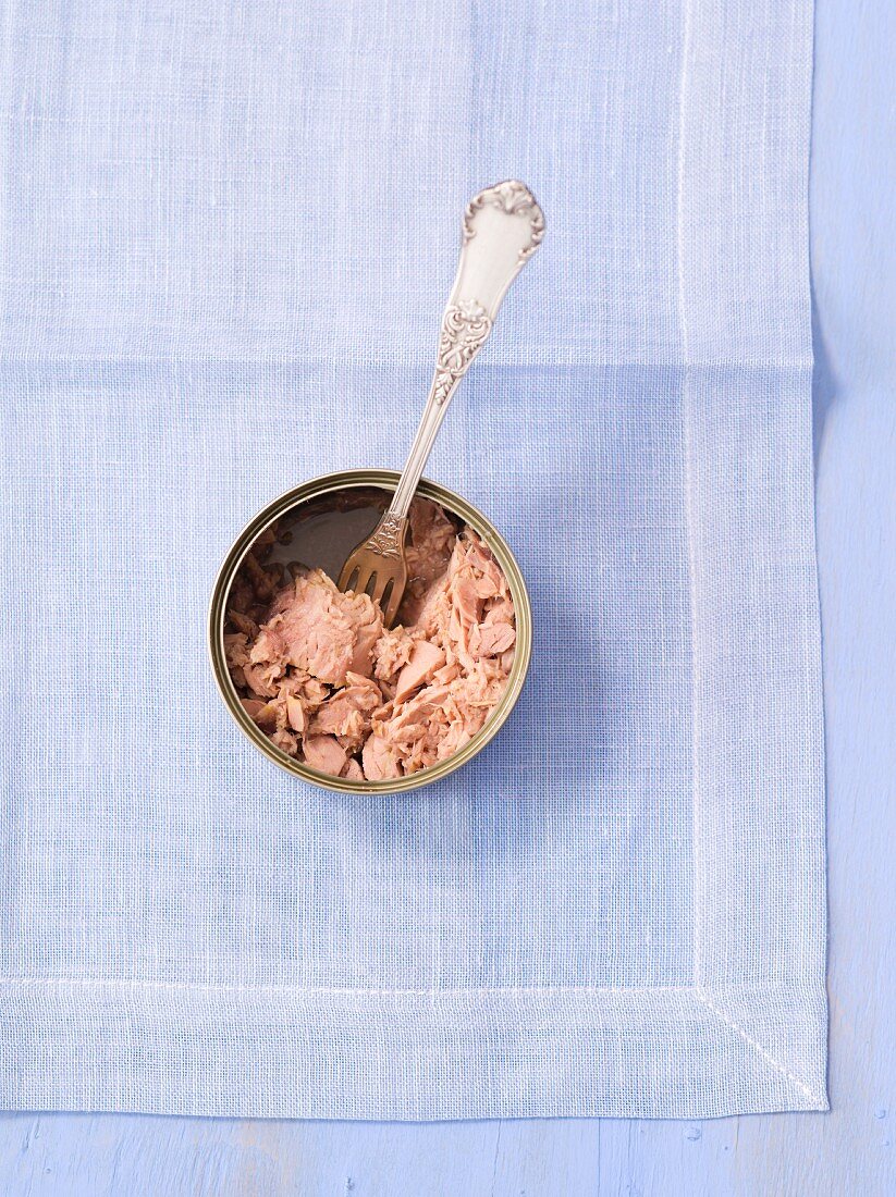 A tin of tuna with a fork