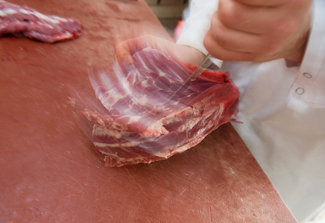 A piece of lamb being jointed