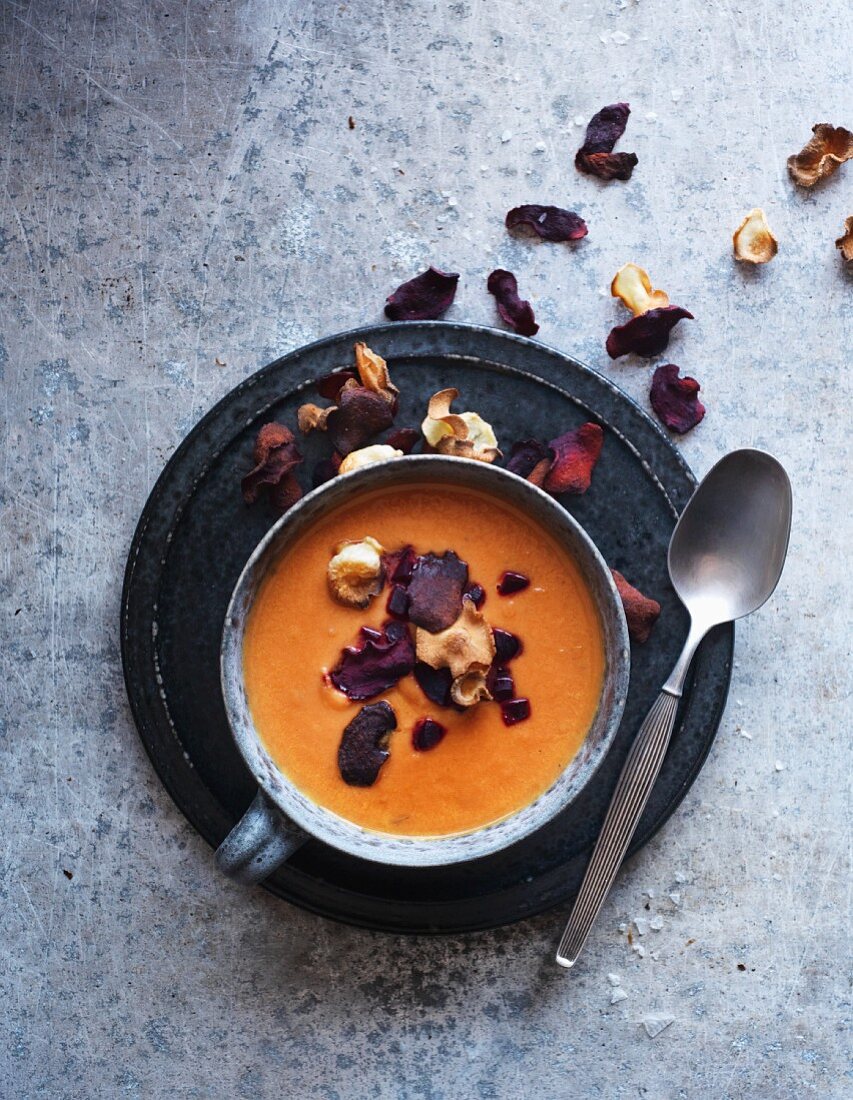Root vegetable soup with vegetable chips