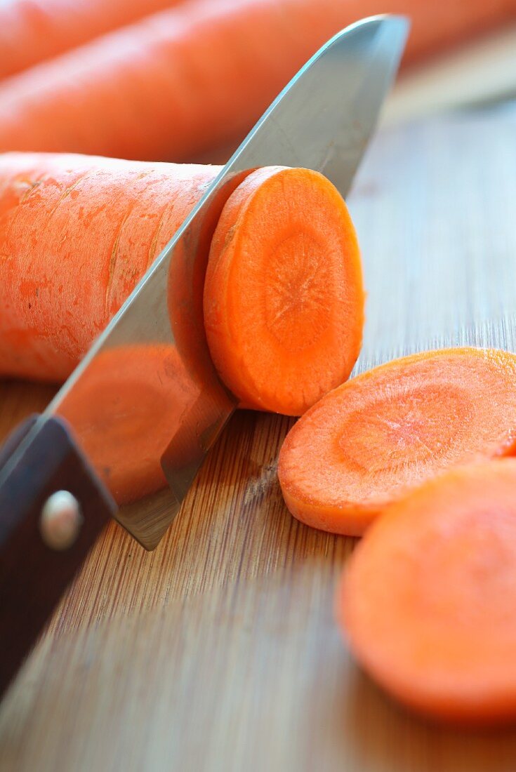 A carrot being sliced