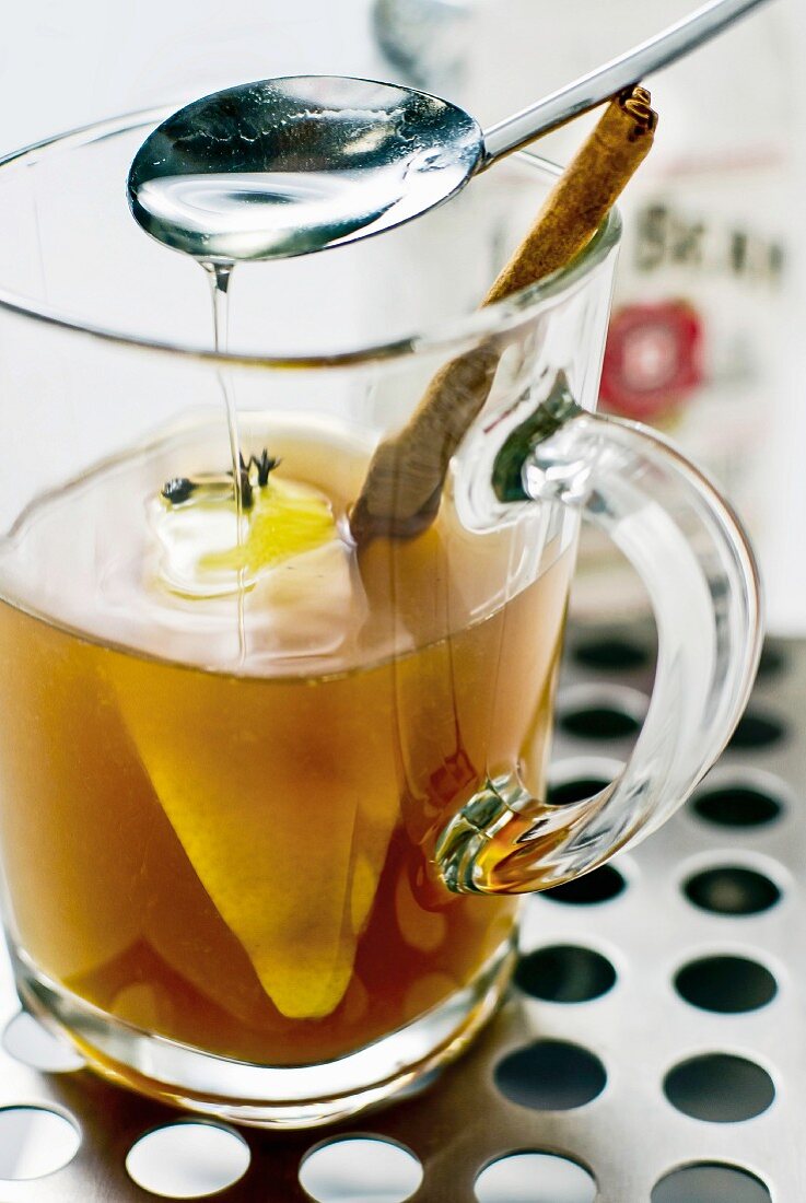 Hot toddy with whiskey and syrup