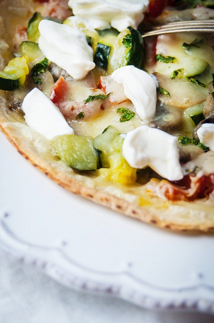 Tortilla pizza with sour cream and vegetables (Mexico)