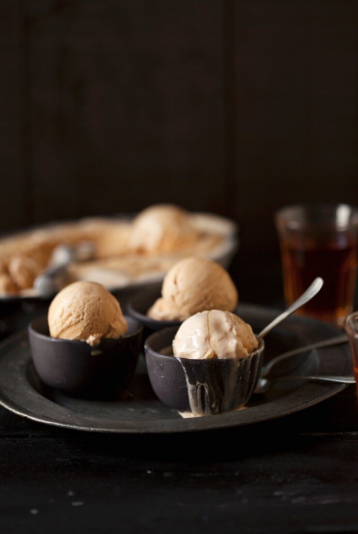Caramel ice cream in small dishes
