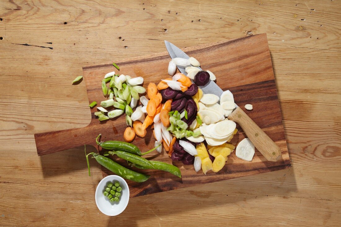 Ingredients for unripened spelt grain soup on a chopping board