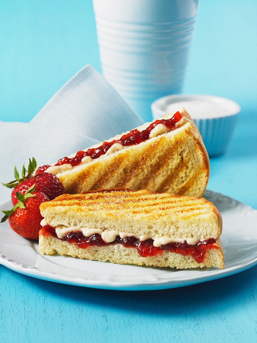 A toasted mascarpone and strawberry jam sandwich