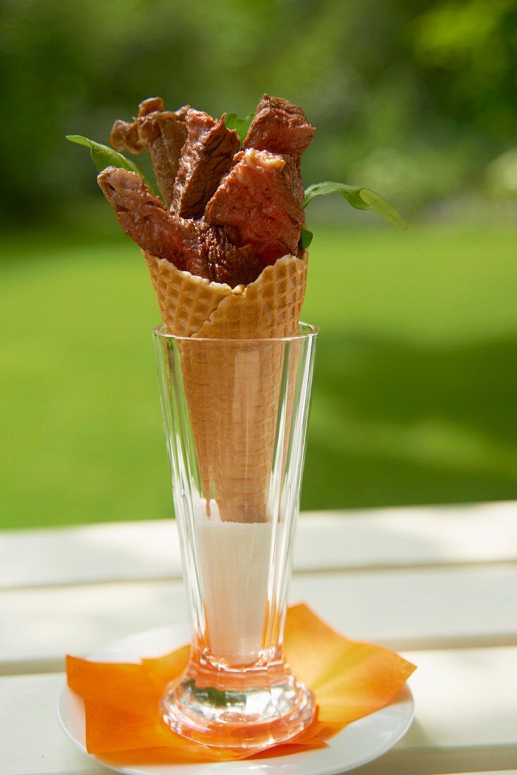 Grilled beef in an ice cream cone