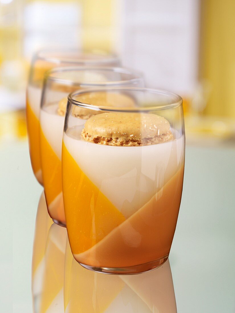 A macaroon in a glass of milk