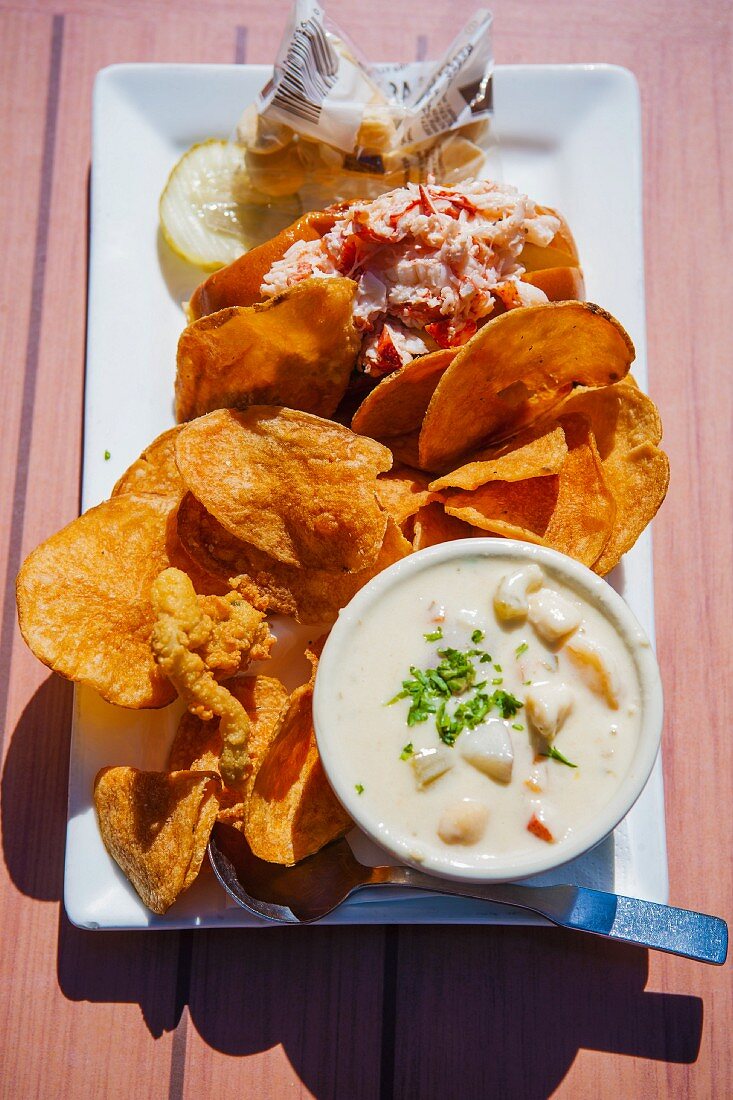 Lobster roll with clam chowder and homemade potato crisps