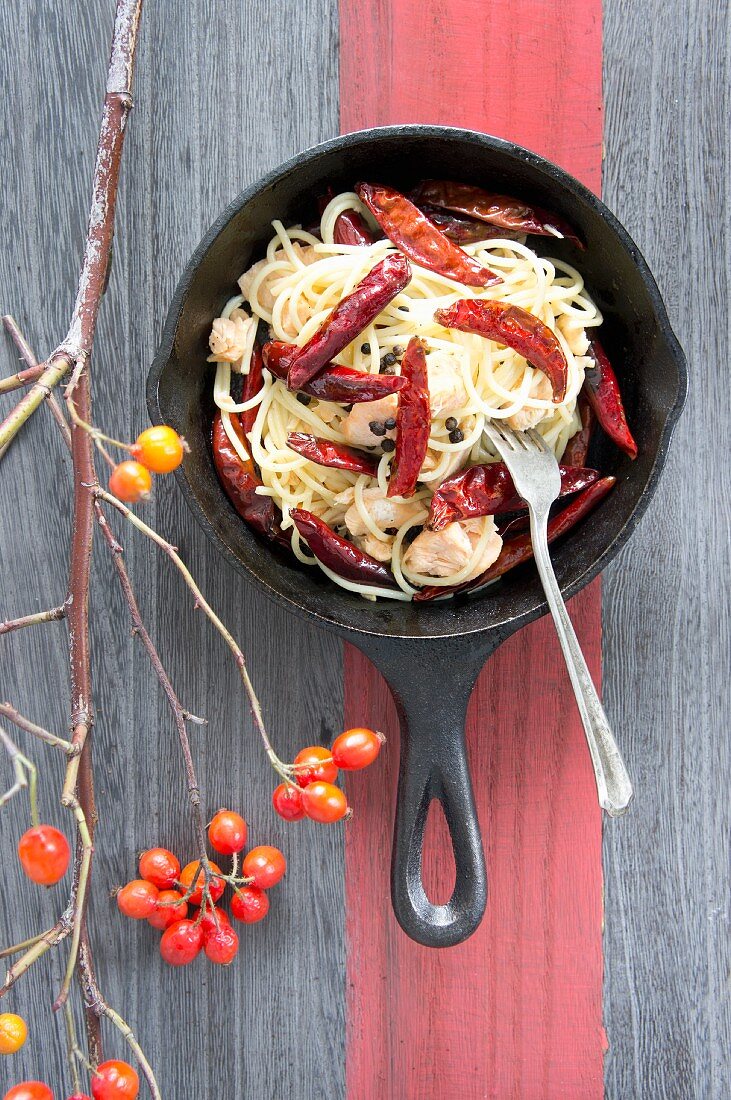 Spaghetti with salmon and chilli peppers