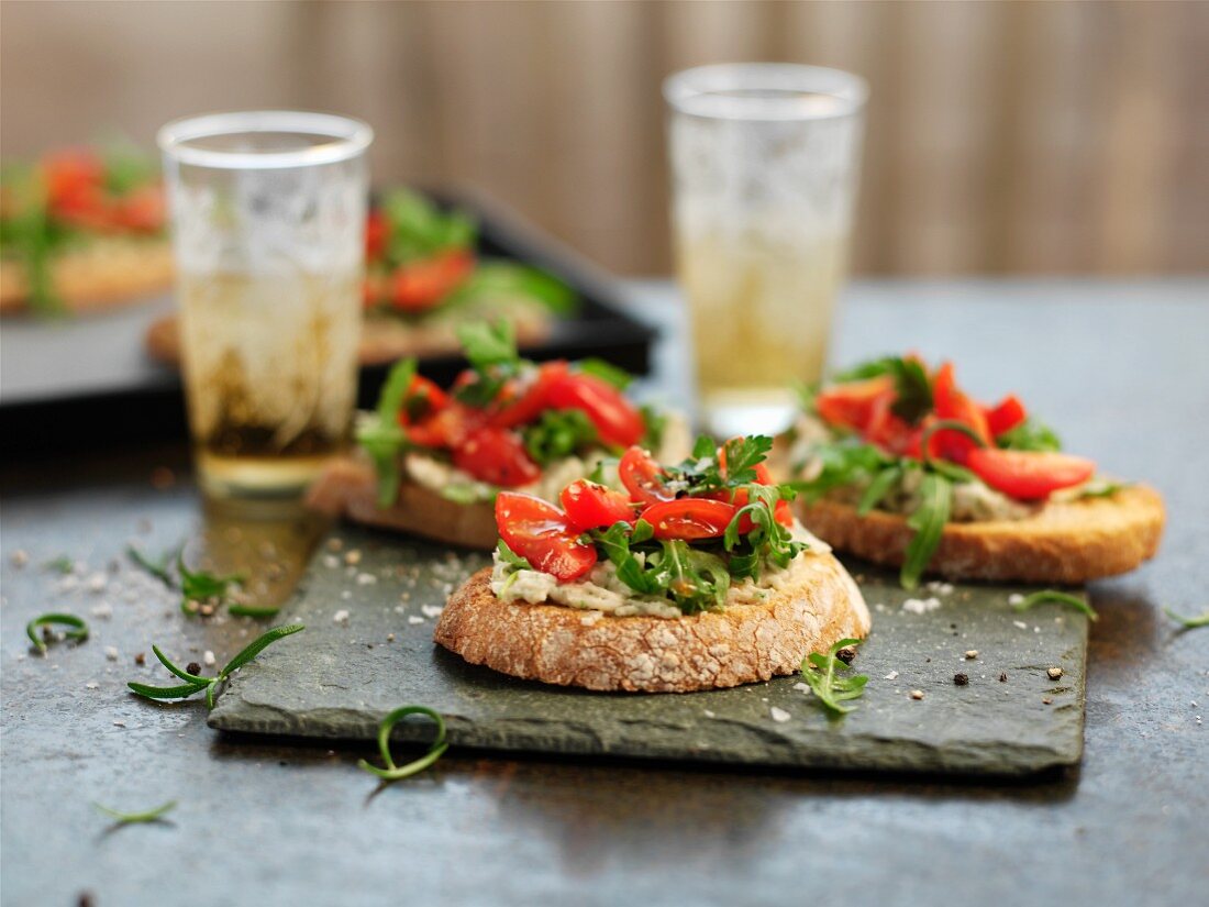Bruschetta with tomato, rocket and white beans