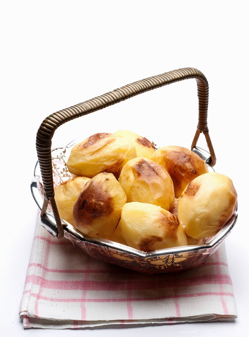 Baked potatoes in a basket