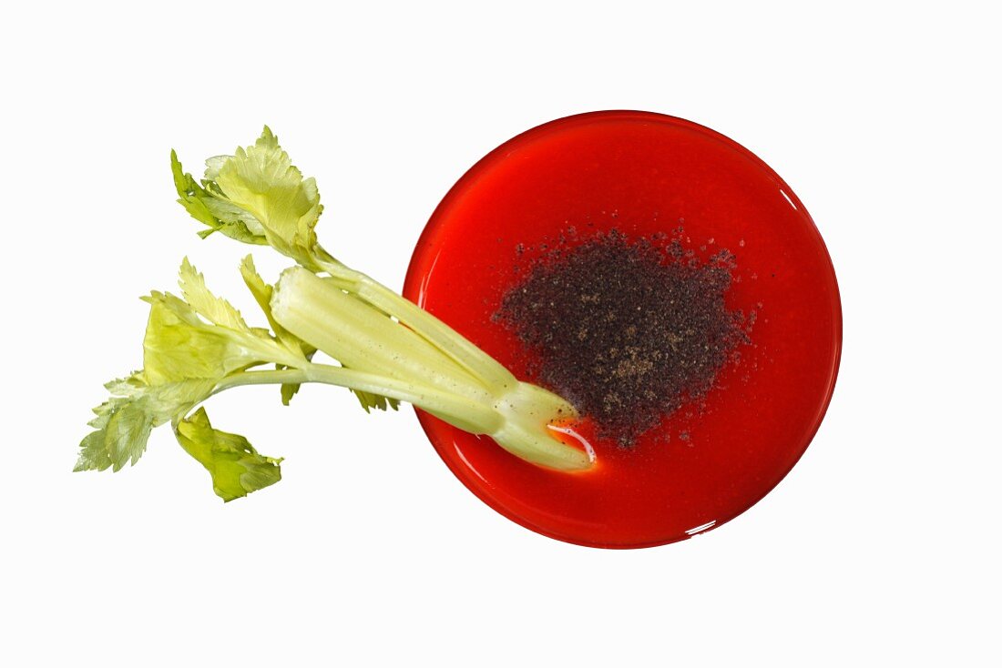 Tomato juice garnished with a stick of celery