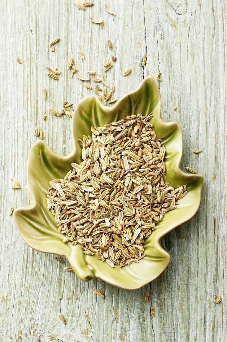 Fennel seeds in a leaf-shaped dish
