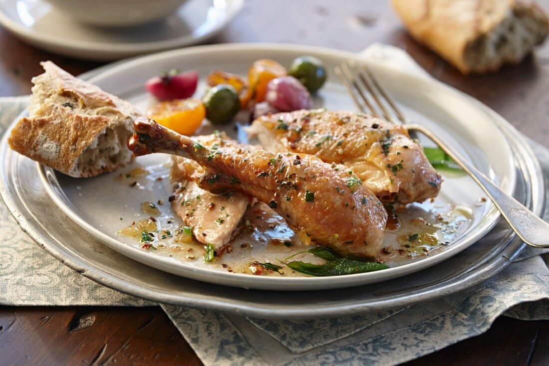 Roast chicken with vegetables and baguette