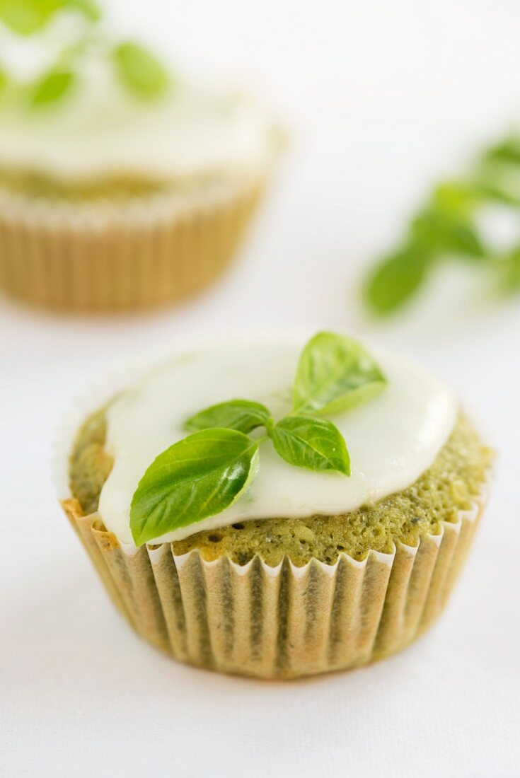 A basil cupcake with icing sugar