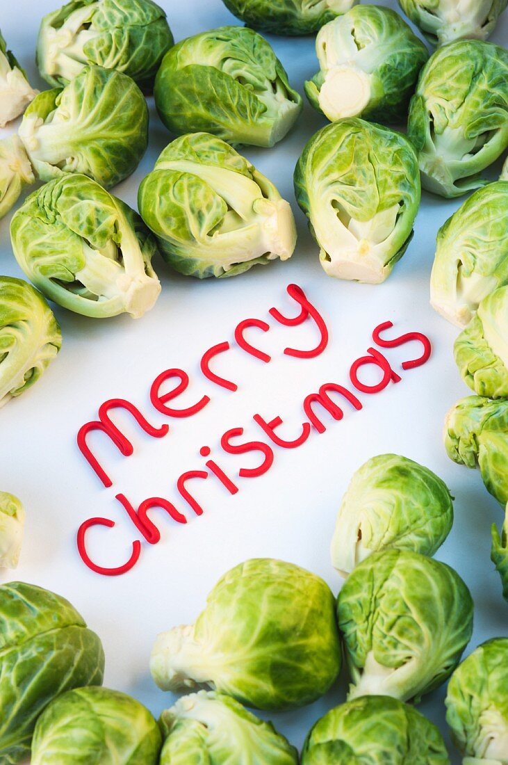 The words 'Merry Christmas' surrounded by Brussels sprouts